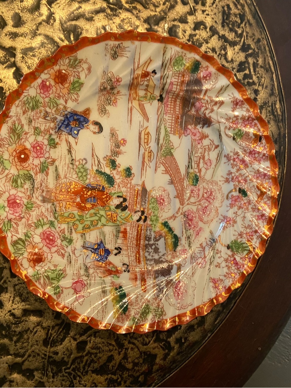 Hand-Painted Porcelain Decorative Plate with Orange Trim